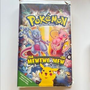 Vintage Pokémon The First Movie VHS tape in plastic clamshell case